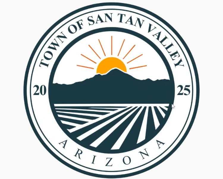 Circular official seal for the Package One design featuring an orange sun rising behind a dark blue mountain silhouette over striped fields with TOWN OF SAN TAN VALLEY ARIZONA 2025 set around the outer ring