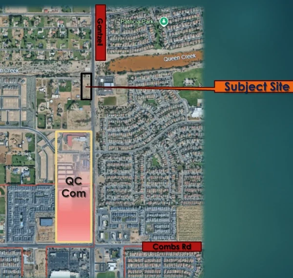 Aerial map with a callout labeled Subject Site marking the annexation parcel on the west side of Gantzel Road just south of the Queen Creek wash. A highlighted area labeled QC Com marks a commercial corridor farther south along Gantzel, with Combs Road at the bottom of the frame.