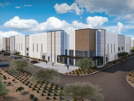 Conceptual rendering of a Project Midway data center building with white and gray panels, wood-tone accents, a glass entrance with a canopy, desert landscaping, and a parking lot
