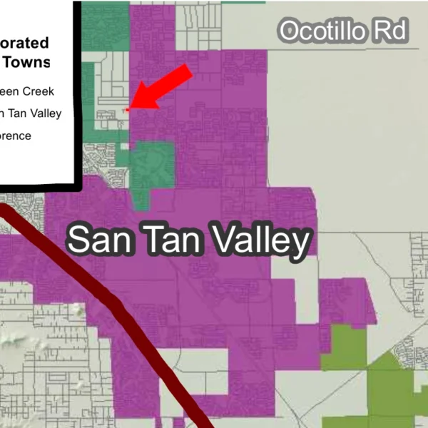 Map showing incorporated town boundaries with Queen Creek in green, San Tan Valley in purple and Florence in olive. A red arrow points to the small annexation parcel in unincorporated county land at Gantzel Road and Lone Star Lane, just outside San Tan Valley's boundary.