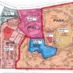 Colored site plan of Apache Junction's City Services Expansion, with labeled areas for the police substation, branch library, community park, 1.43-acre fishing lake, and parks maintenance yard.