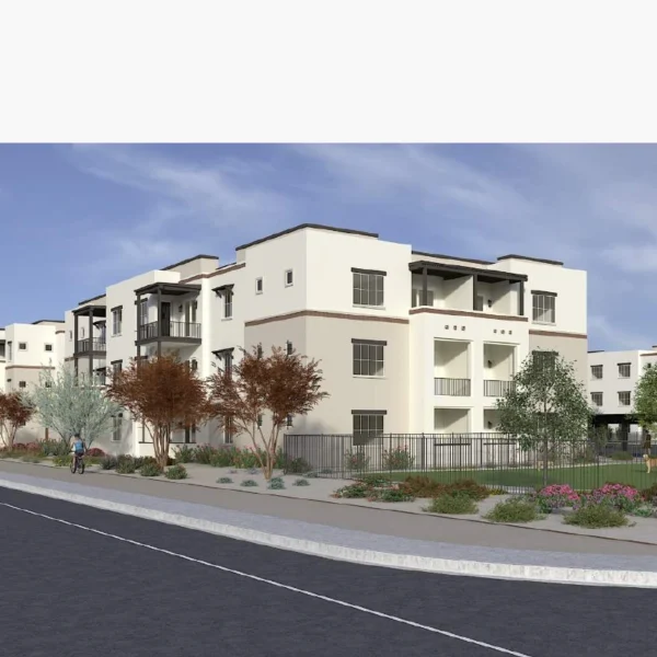 Rendering of Bella Norte's three-story apartment buildings along the street, with balconies, desert landscaping and a fenced dog run