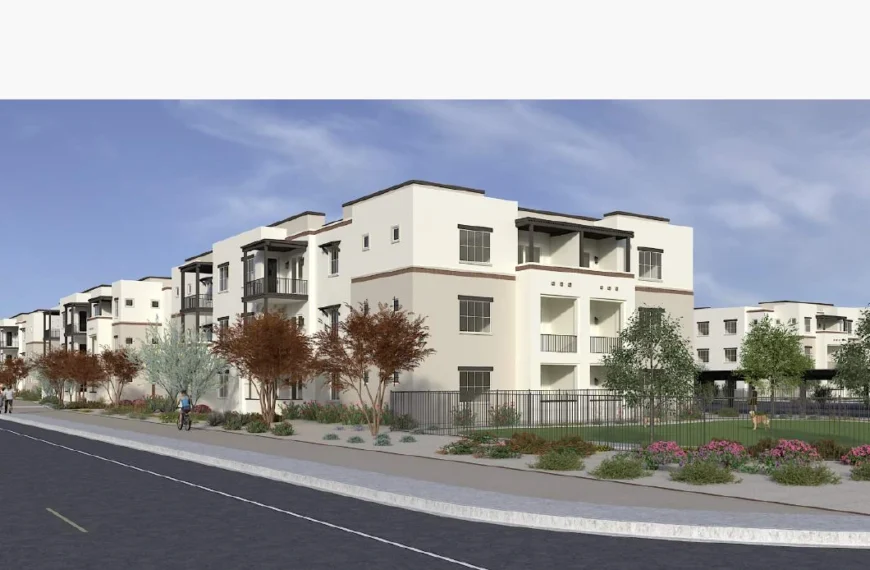 Rendering of Bella Norte's three-story apartment buildings along the street, with balconies, desert landscaping and a fenced dog run