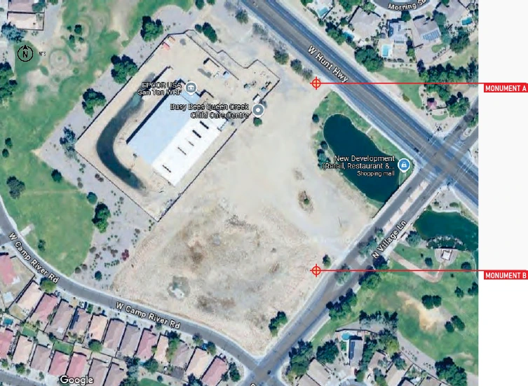 Aerial view of the site marking Monument A on the West Hunt Highway frontage and Monument B on North Village Lane near the Busy Bees child care center