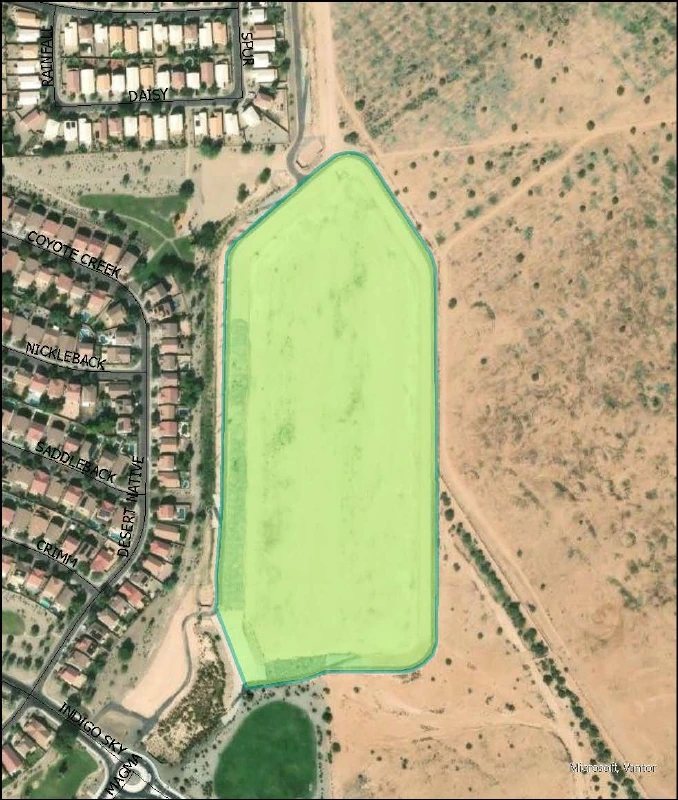 Aerial view of the Gantzel Basin Park draft site in Johnson Ranch with homes to the west and open desert to the east