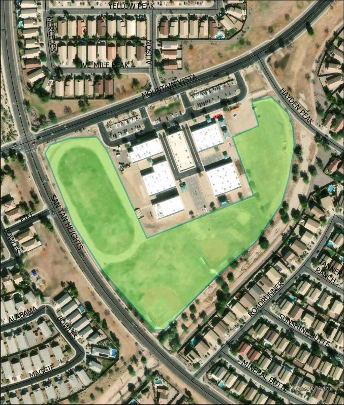 Aerial view of the Mountain Vista Park draft site at San Tan Heights Middle School showing fields a track and parking